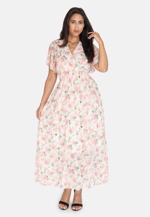 Robe maxi avec un imprimé floral rose et vert, à manches courtes et taille cintrée, en tissu léger et fluide.
