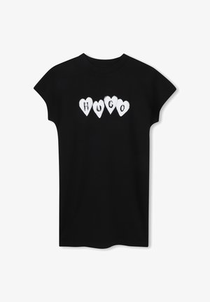 T-shirt en coton noir arborant cinq formes de cœur blanches avec le mot "HUGO" en lettres noires à l'intérieur. Manches courtes et coupe décontractée.