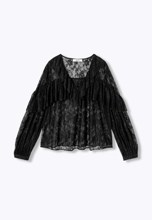 Haut en dentelle noire avec manches longues, accents à volants, encolure en V et texture transparente, doté d'une coupe ample et fluide.