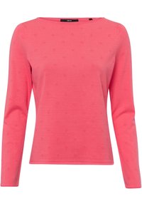 Top de manga larga color coral claro, hecho de una tela suave, que presenta un patrón texturizado con pequeñas cruces en relieve por todo el diseño y un cuello redondo.