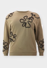 Bluza oliwkowa z długimi rękawami, z czarnymi wypukłymi kwiatowymi wzorami na przodzie i rękawach. Wykonana z miękkiej, teksturowanej tkaniny.