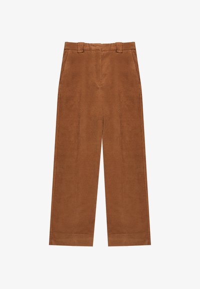 Bruine corduroy wijde broek met een gladde textuur, voorzien van zijzakken en een tailleband met lussen voor een riem.
