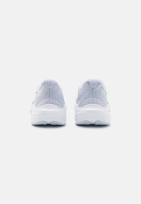 Light grey athletic shoes with a textured mesh upper, rounded white sole, and subtle green accents on the side. Back view with cushioned heel.