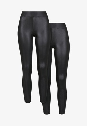 Zwarte leggings, gemaakt van glad, stretchy materiaal. Beschikt over een hoge tailleband en een glanzende afwerking. Eén grotere en één kleinere maat.