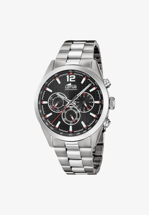 Silver metal chronograph wristwatch with black dial, three subdials, tachymeter scale, and luminous hour markers and hands.