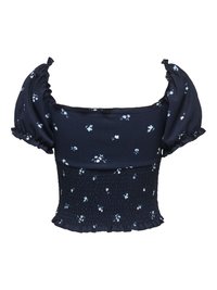 Blouse courte bleu marine avec manches courtes bouffantes, encolure carrée, taille smockée, et petits motifs floraux bleu clair et blanc.