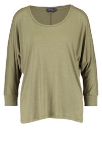 Olivově zelený dlouhý rukáv top s volným výkonem, kulatým výstřihem a žebrovanými manžetami. Měkká tkanina s jemnou texturou a uvolněným siluetou.