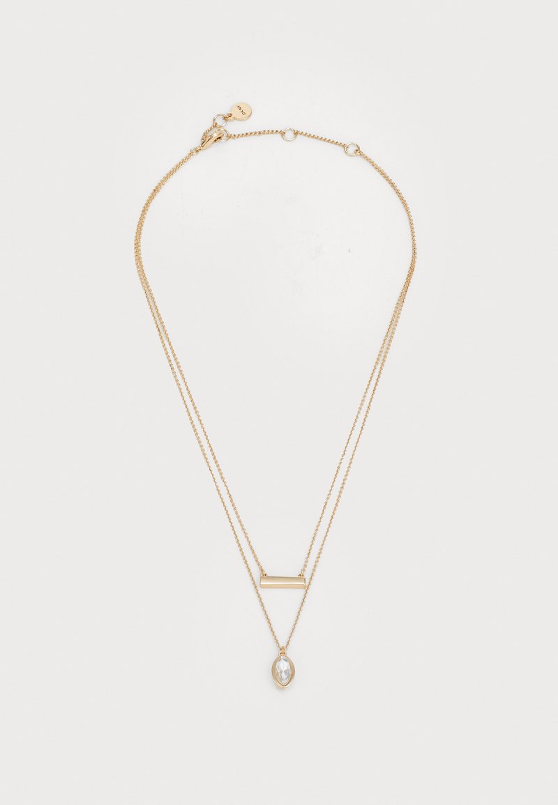 Náhrdelník se zlatou vrstvou, který obsahuje dvě řetězy; jeden s obdélníkovou tyčinkou a druhý s přívěskem ve tvaru marquise.