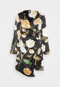 Robe noire portefeuille ornée de grands motifs floraux dans des tons crème, jaune et vert. Confectionnée en tissu lisse avec des manches longues et un détail à nouer.