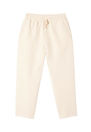Light beige sweatpants with an elastic waistband and drawstring. Features side pockets and a tapered leg design. Soft, textured fabric.