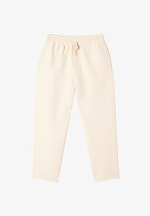 Hellbeige Sweatpants mit elastischem Bund und Kordelzug. Besitzt seitliche Taschen und ein tailliertes Bein design. Weicher, texturierter Stoff.