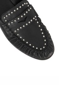Black leather loafer featuring silver studs, a rounded toe, and gathered leather detailing along the edge. Side slit design for added texture.