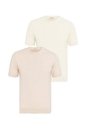 Dwa gładkie swetry z krótkim rękawem i okrągłym dekoltem w kolorze kremowym i beżowym, pokazane z przodu na białym tle.