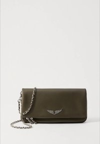 Olive green leather clutch with chain strap, featuring a silver wing logo accent and a smooth texture. Rectangular shape with zip closure.