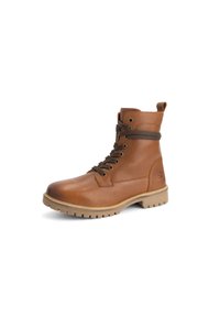 Bruine leren veterschoen tot de enkel met een robuuste zool en treklus, ontworpen voor casual of buitengebruik.