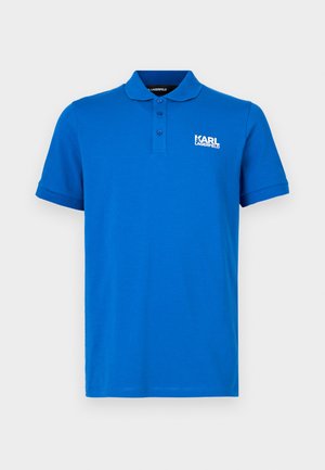 Plava polo majica od glatkog pamuka s ovratnikom, tri gumba na preklopu i bijelim logotipom "KARL LAGERFELD" na lijevoj strani prsa.