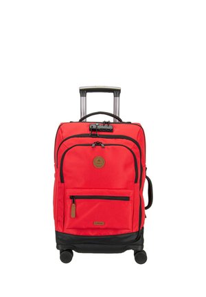 Red soft-sided rolling suitcase with telescoping handle, multiple zippered compartments, black base, and side carry handle on white background.