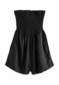 Combinaison noire sans manches avec corsage élastique smocké et bas ample style short, en tissu léger.
