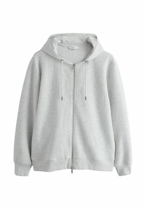 Pelēka zipa kapuce džemperis ar reljefainu ribotu rakstu, garām piedurknēm, regulējamām auklām un brīvi pieguļošu fitu. Mīksts audums ar kapuci.