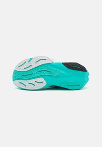 New Balance FUELCELL REBEL V4 - Road running shoes - green