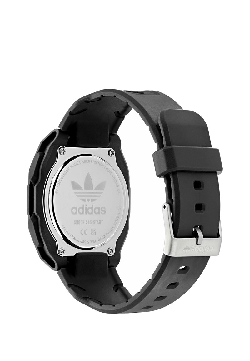 Black Adidas wristwatch with adjustable silicone strap, stainless steel backplate, shock resistant, and metal buckle with Adidas logo.
