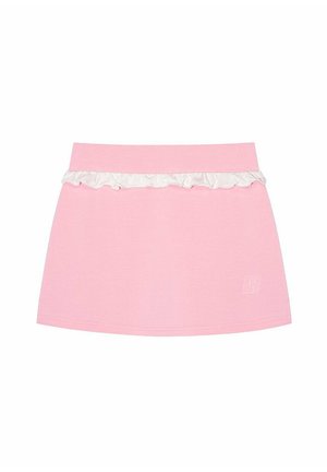 Różowa spódnica z miękkiego materiału, z białym falbaniastym wykończeniem i logo w prawym dolnym rogu. Projekt jest prosty i casualowy.