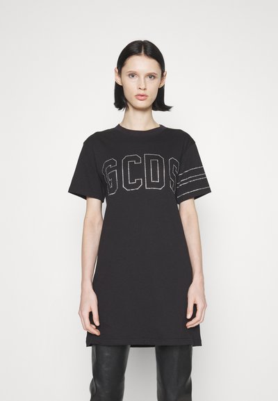Μαύρο βαμβακερό φόρεμα-μπλούζα με στρογγυλή λαιμόκοψη, που διαθέτει λαμπερά γράμματα "GCDS" και ρίγες στο μανίκι.