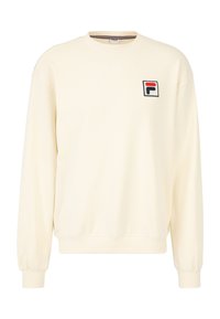Sudadera color crema elaborada con tejido suave, con cuello redondo acanalado y mangas largas. Presenta un pequeño logo bordado en el pecho.