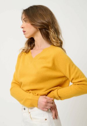 COL V - Stickad tröja - turmeric