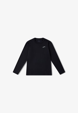 Must must sleeves ja ümmarguse kaelusega must sportlik särk, valmistatud siledast kangast, millel on rinnal väike hõbedane logo ja lamedad õmblused.