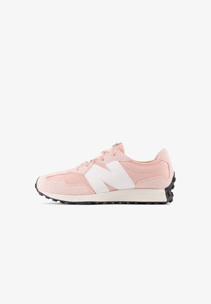 Light pink athletic shoe with white accents and mesh detailing. Features a rounded toe, textured fabric, and a black rubber sole.