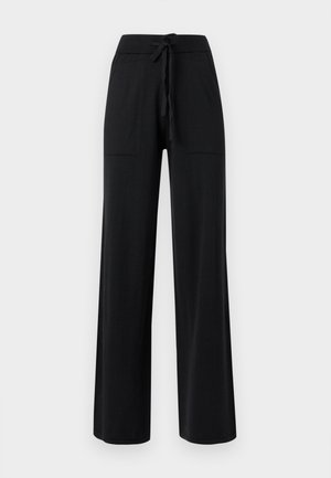 Mustat leveälahkeiset housut, joissa on joustava vyötärönauha ja edessä kiristysnauha, sekä kaksi etutaskua.