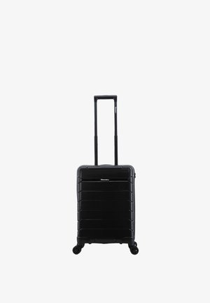 Black hard-shell suitcase with horizontal grooves, two extendable handles, four wheels, and a logo on the front. Smooth texture.