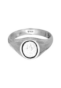Sökringar i silver med ett cirkulärt, texturerat centrumpunkt. Har en slät ring och en framträdande yttre kant. Märkt "925" för sterlingsilver.
