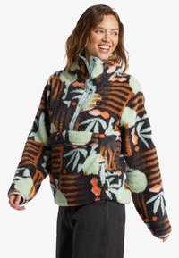 Fleece pullover met een hoge kraag, voorzien van een kleurrijk bladerenpatroon, mintgroen en donkere tinten, en een voorkantzak met drukknoopsluiting.