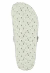 White sandal sole with textured, hexagonal and angular tread pattern for grip, shown from bottom view on a white background.