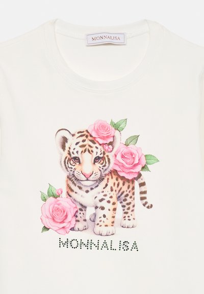 Hvit skjorte med en baby tiger illustrasjon omgitt av rosa roser, og merkenavnet Monnalisa under i små svarte prikker.