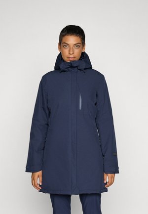 Marineblå vanntett parka med hette, med glidelås foran, trykknapper og en glidelåslomme på brystet. Glatt stoff og avslappet passform.
