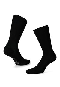 Czarne bawełniane skarpetki o gładkiej fakturze, z prążkowanymi mankietami i wzmocnionym palcem. Posiadają logo w okolicy pięty.