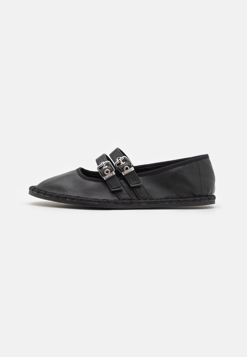 Ballerines en cuir noir avec deux brides ajustables à boucles en métal, bout arrondi et semelle en caoutchouc cousue.
