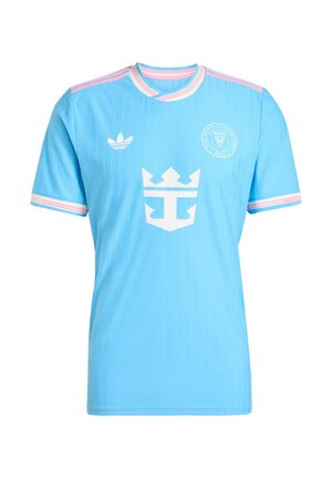 Light blue athletic jersey with vertical stripes, white collar and sleeve accents, featuring a large white emblem and logo on the front.