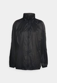 Czarna, lekka kurtka wykonana z gładkiego, wodoodpornego materiału. Posiada wysoki kołnierz, pełny zamek błyskawiczny z przodu oraz elastyczne mankiety i dolną krawędź.