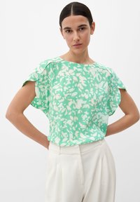 Bluse mit grünem und weißem Blumenmuster, lockerer Passform, weiten Ärmeln und rundem Ausschnitt; aus leichtem, glattem Stoff gefertigt.