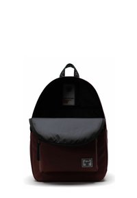 Sac à dos avec compartiment principal ouvert, couleur bordeaux foncé, poche avant zippée, poignée noire et écusson logo sur le bas de l'avant.
