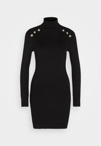 Robe noire en maille à manches longues avec col roulé et six boutons argentés décoratifs sur les épaules, silhouette ajustée.