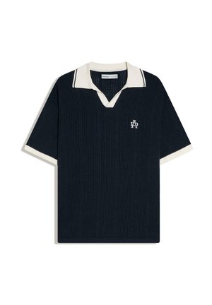Navy blue short-sleeve knit shirt with white collar and sleeve edges, textured vertical pattern, and small white logo on the chest.