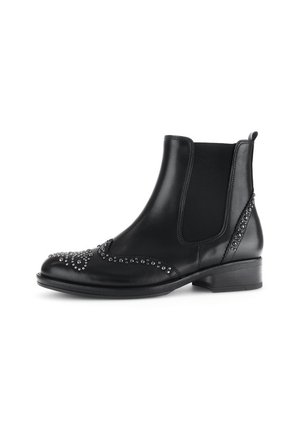 Bottines en cuir noir avec panneaux élastiques sur les côtés, clous décoratifs en argent sur le bout et sur le côté, et un petit talon. Texture lisse sur l'ensemble.