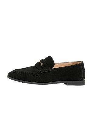 Black suede loafer with low heel, moccasin stitching, and gold-tone metal bit detail on the vamp, side view.