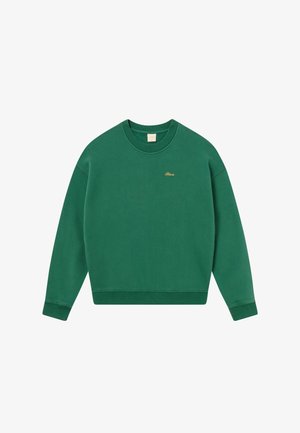 Green sweatshirt featuring a crew neckline, ribbed cuffs, and hem. Includes a small gold logo on the front. Soft fabric texture.