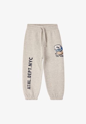 Jasnoszare dresy z elastycznym paskiem, sznurkiem, ściągaczami na nogawkach, nadrukiem po bokach z napisem "ATHL.DEPT.NYC" oraz grafiką uśmiechniętej postaci.